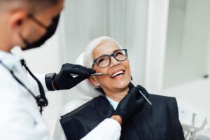 Dental consultation setting with dentist and patient in modern clinic