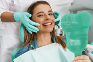 Patient and dentist discussing dental treatment options in a modern, calming office